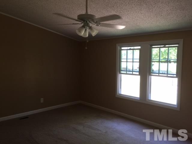 1390 Langdon Road Angier, NC 27501 - Photo 18 of 24 an empty room with a window