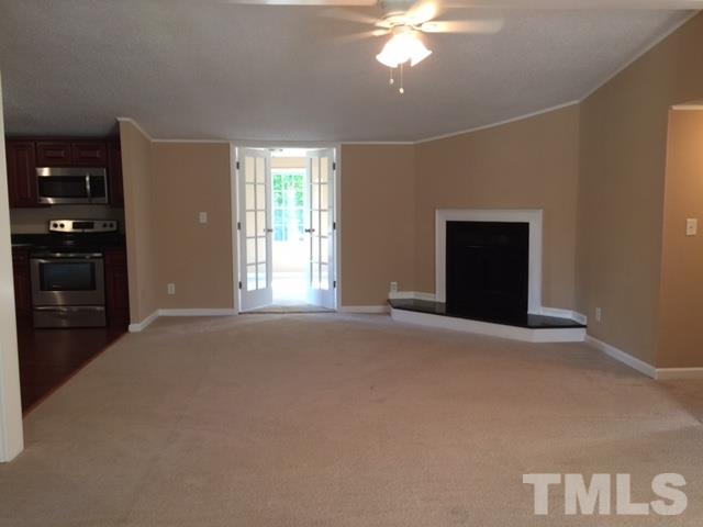1390 Langdon Road Angier, NC 27501 - Photo 4 of 24 a view of an empty room with a window