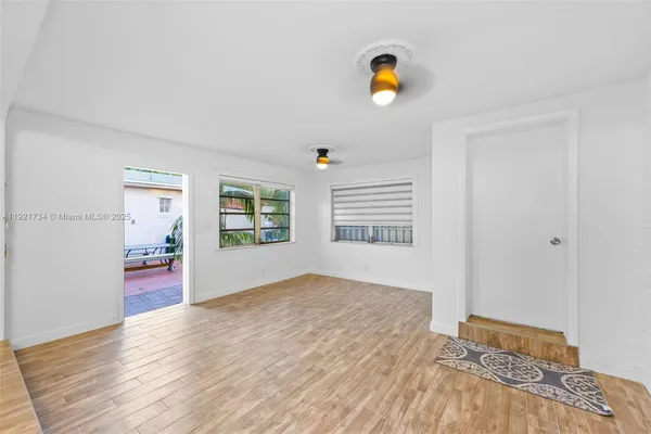 a view of an empty room and window