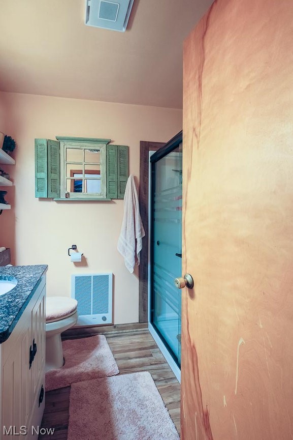 827 Bakers Addition Road Hopedale, OH 43976 - Photo 16 of 34 Bathroom featuring wood-type flooring, toilet, and vanity