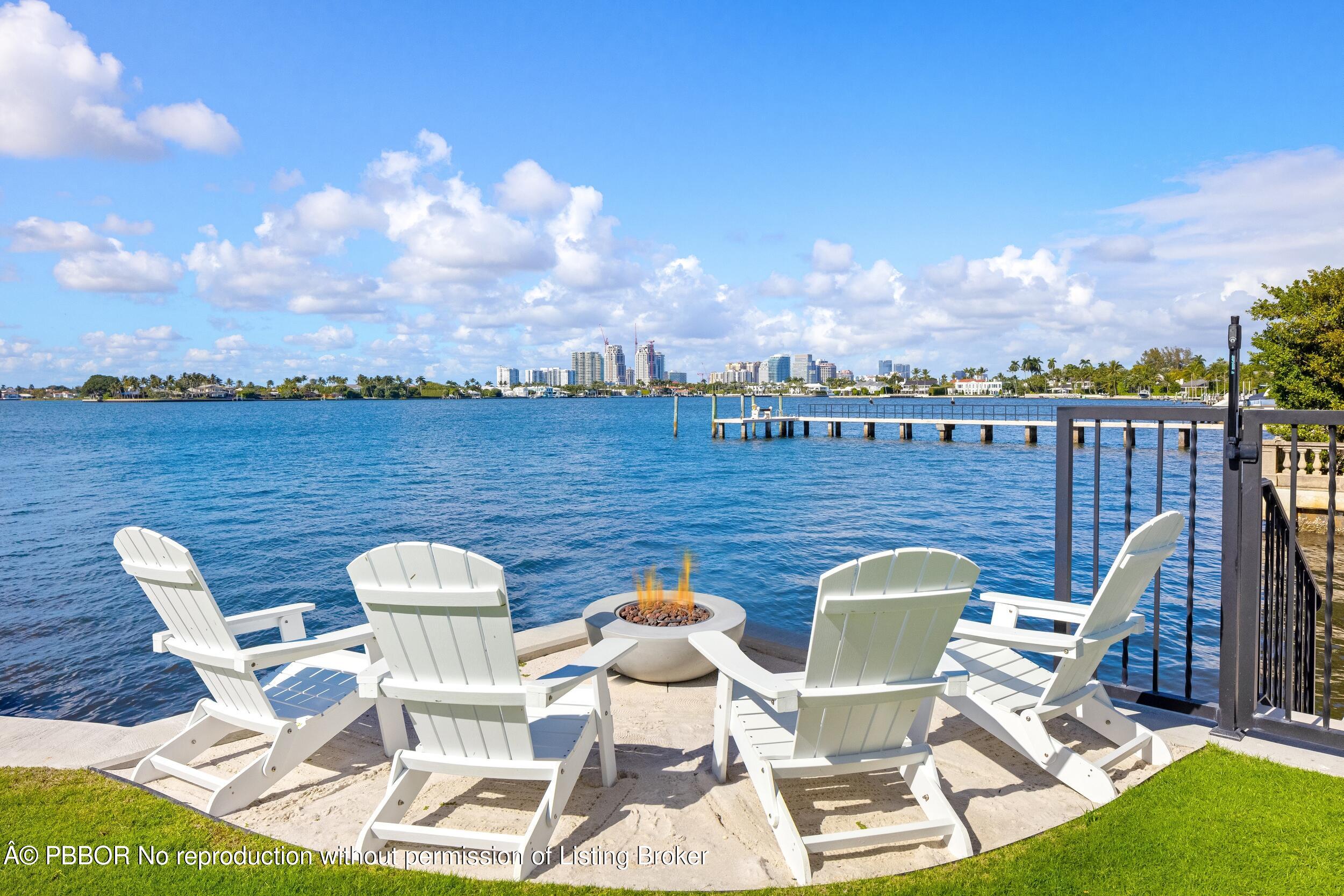 800 South County Road Palm Beach, FL 33480 - Photo 11 of 76 a view of a lake with furniture