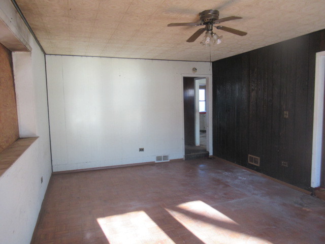 28448 West Big Hollow Road Ingleside, IL 60041 - Photo 17 of 28 a view of a livingroom with a chandelier fan