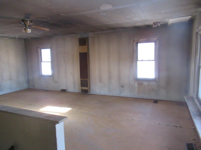 28448 West Big Hollow Road Ingleside, IL 60041 - Photo 19 of 28 an empty room with windows