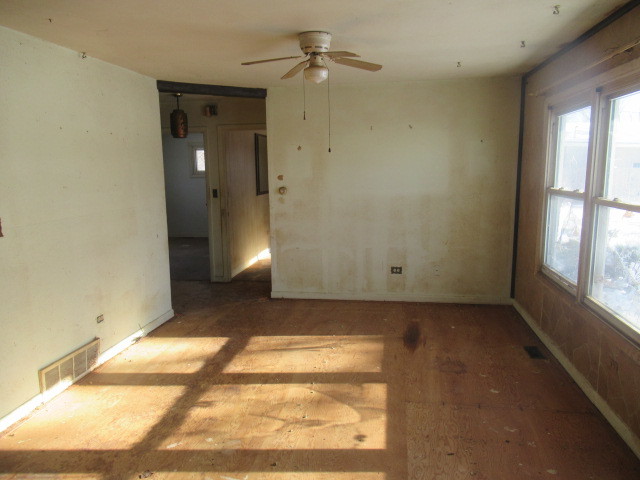 28448 West Big Hollow Road Ingleside, IL 60041 - Photo 4 of 28 an empty room with windows