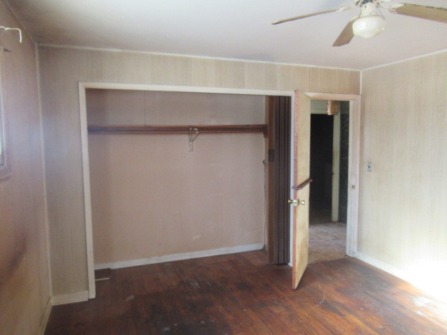 28448 West Big Hollow Road Ingleside, IL 60041 - Photo 10 of 28 a view of an empty room with wooden floor