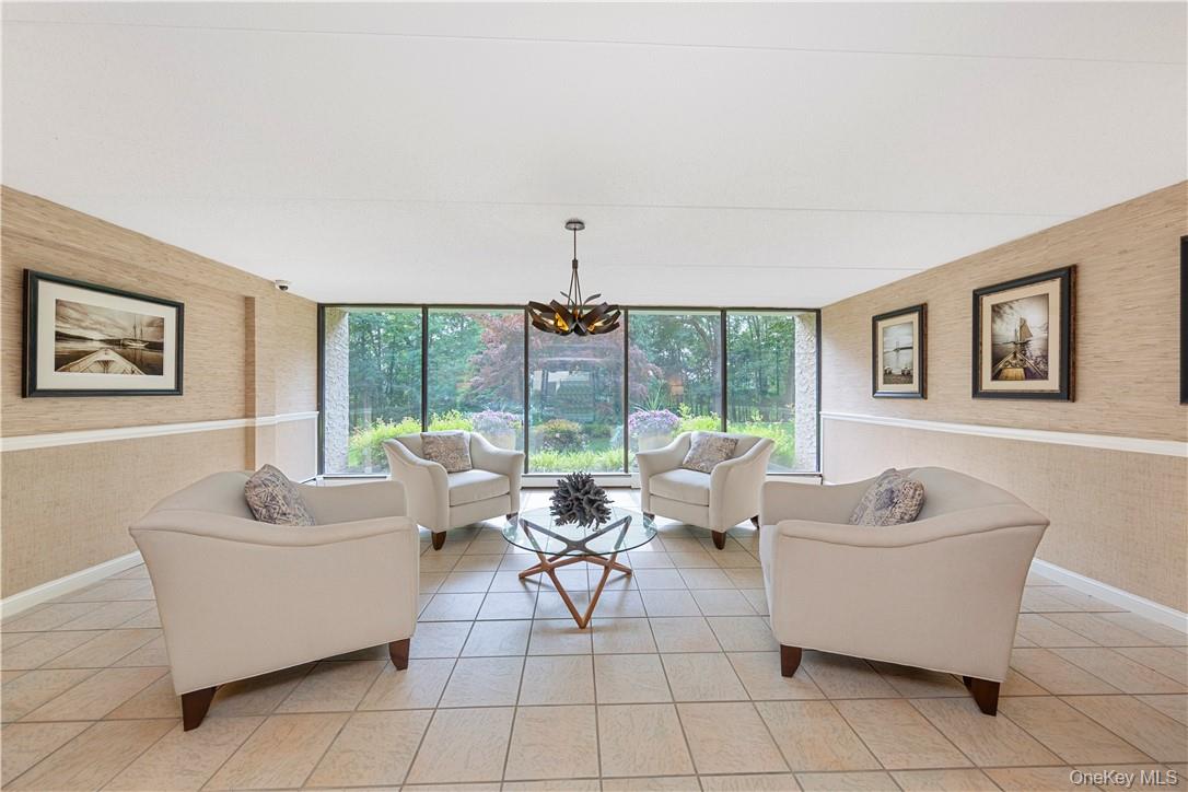 150 Overlook Avenue, Unit 2K Peekskill, NY 10566 - Photo 18 of 26 a living room with furniture and a large window