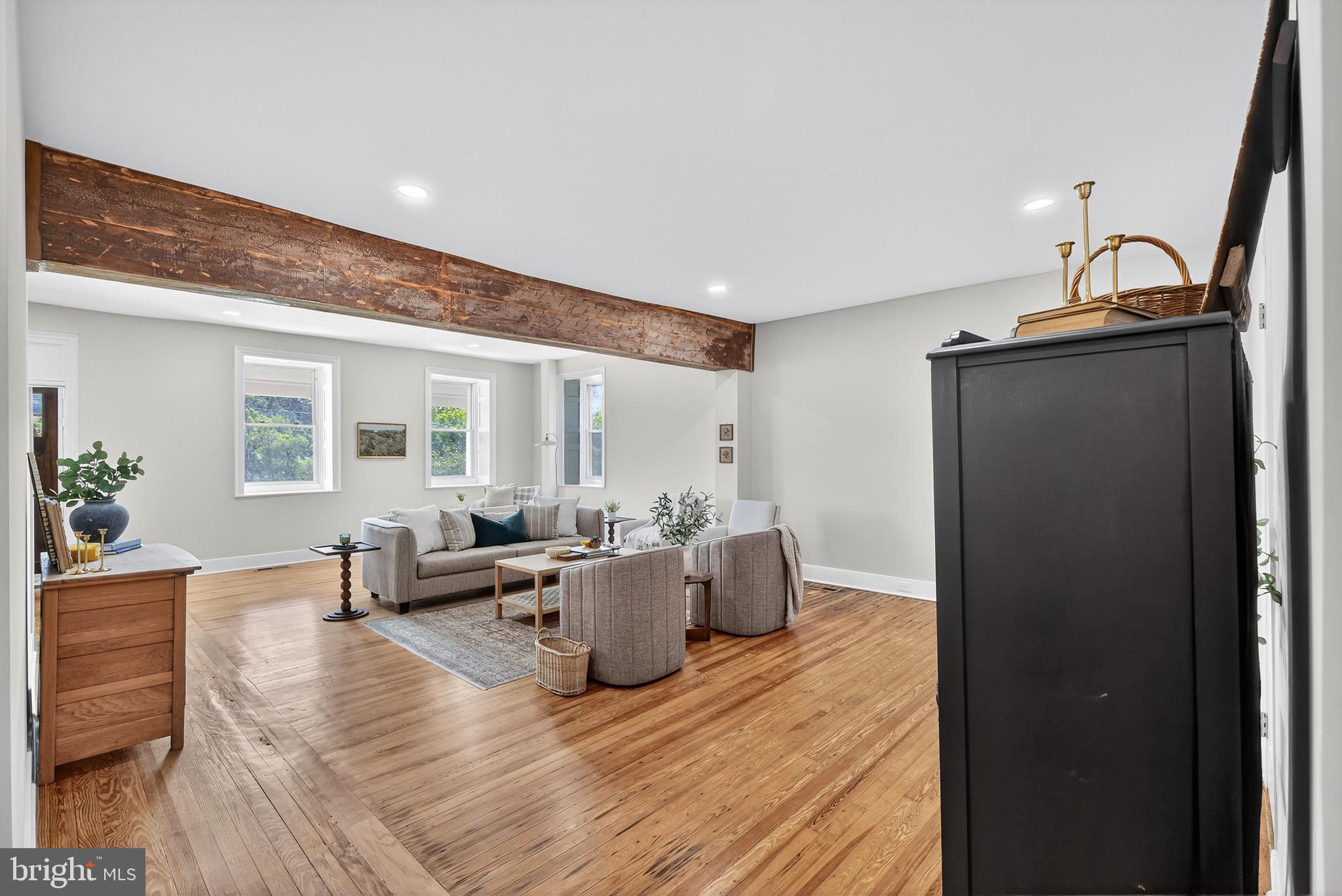 225 East Canal Road York, PA 17404 - Photo 16 of 81 a living room with furniture and a wooden floor