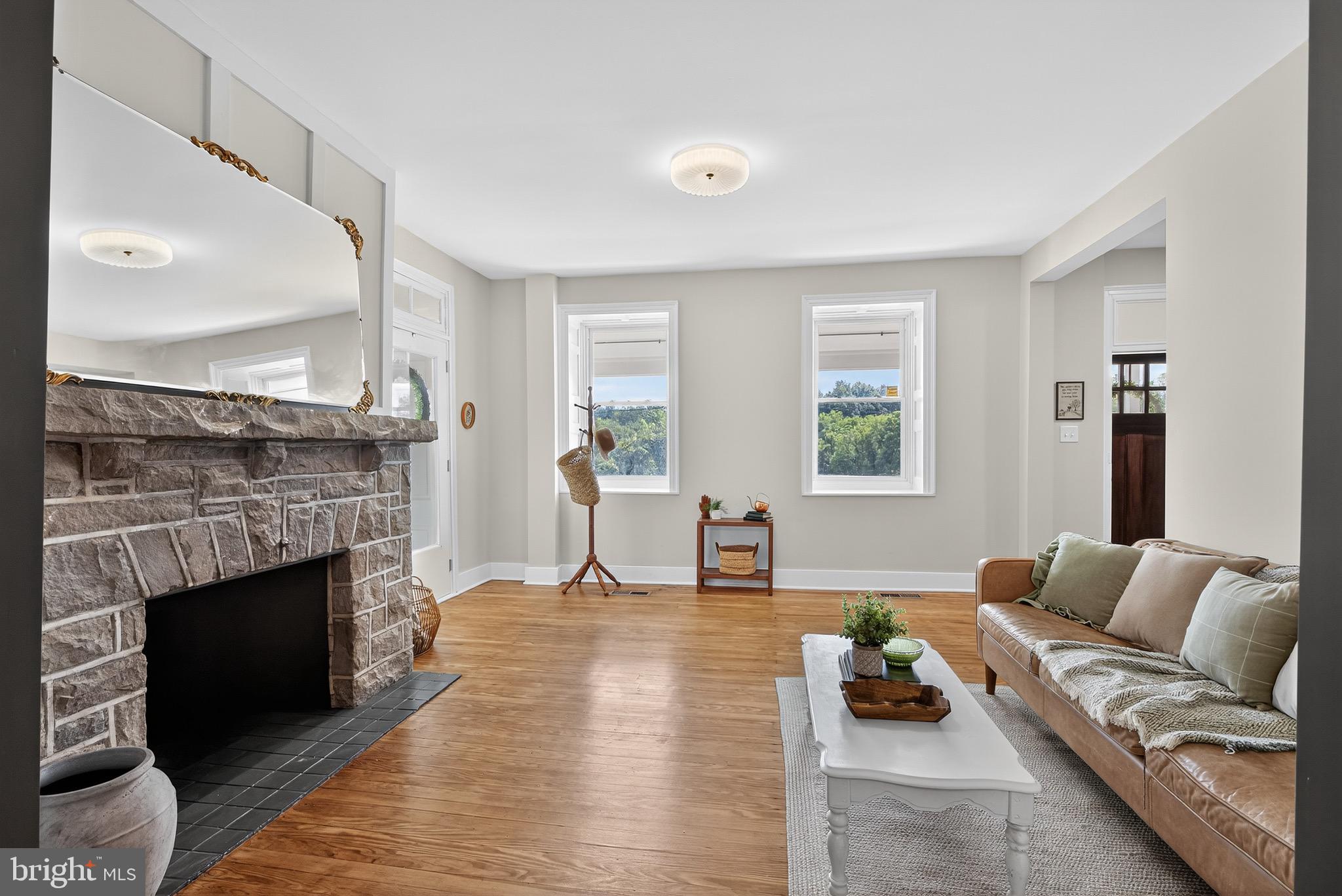 225 East Canal Road York, PA 17404 - Photo 21 of 81 a living room with furniture and a fireplace