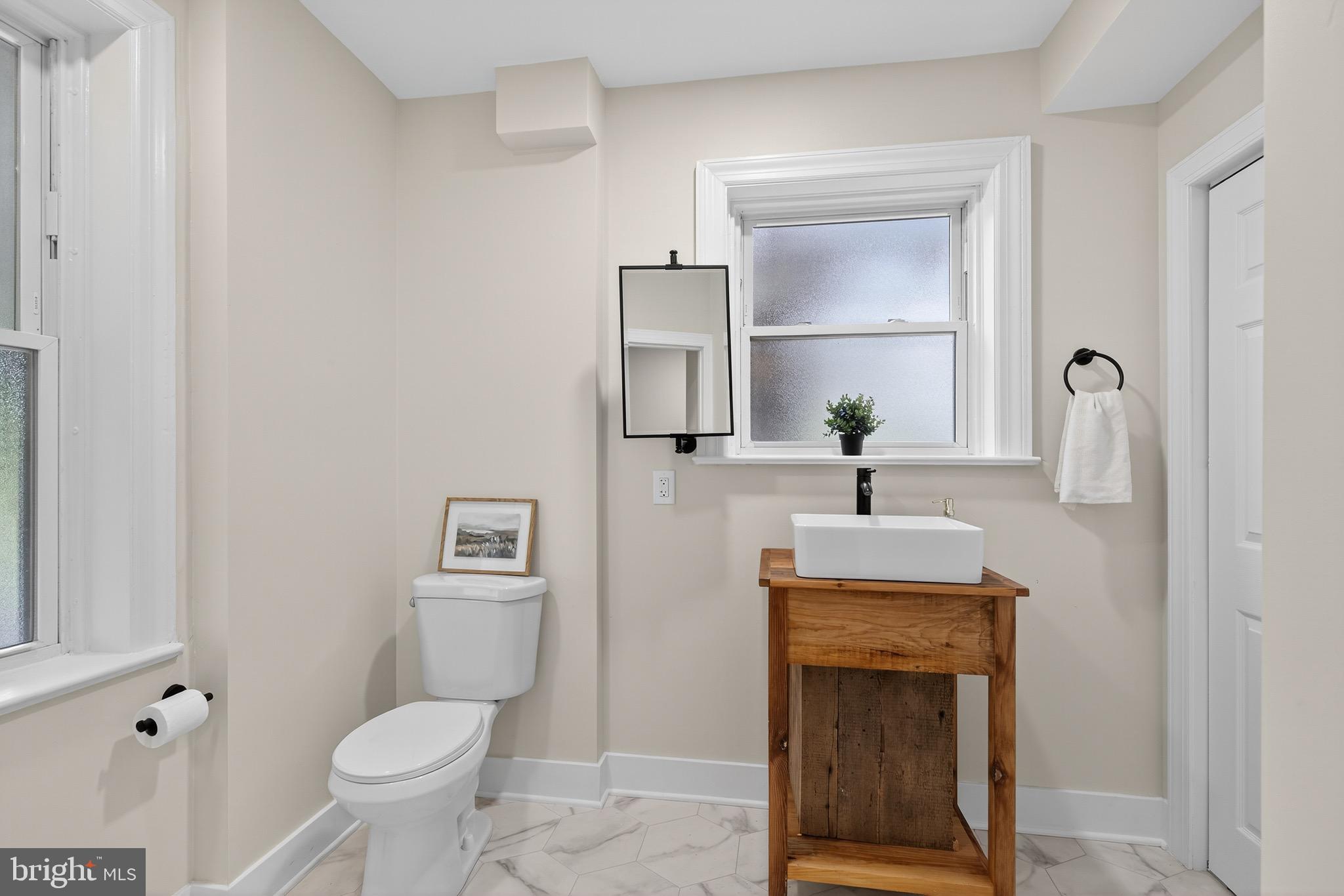 225 East Canal Road York, PA 17404 - Photo 32 of 81 a bathroom with a sink toilet and mirror
