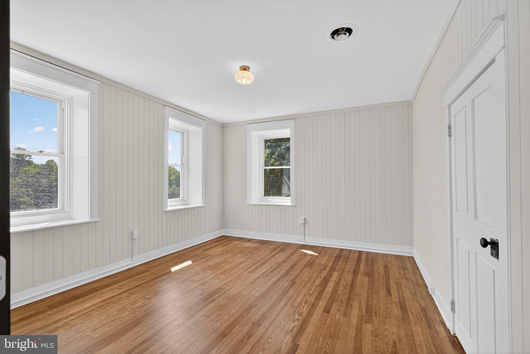 225 East Canal Road York, PA 17404 - Photo 37 of 81 a view of a room with wooden floor and windows