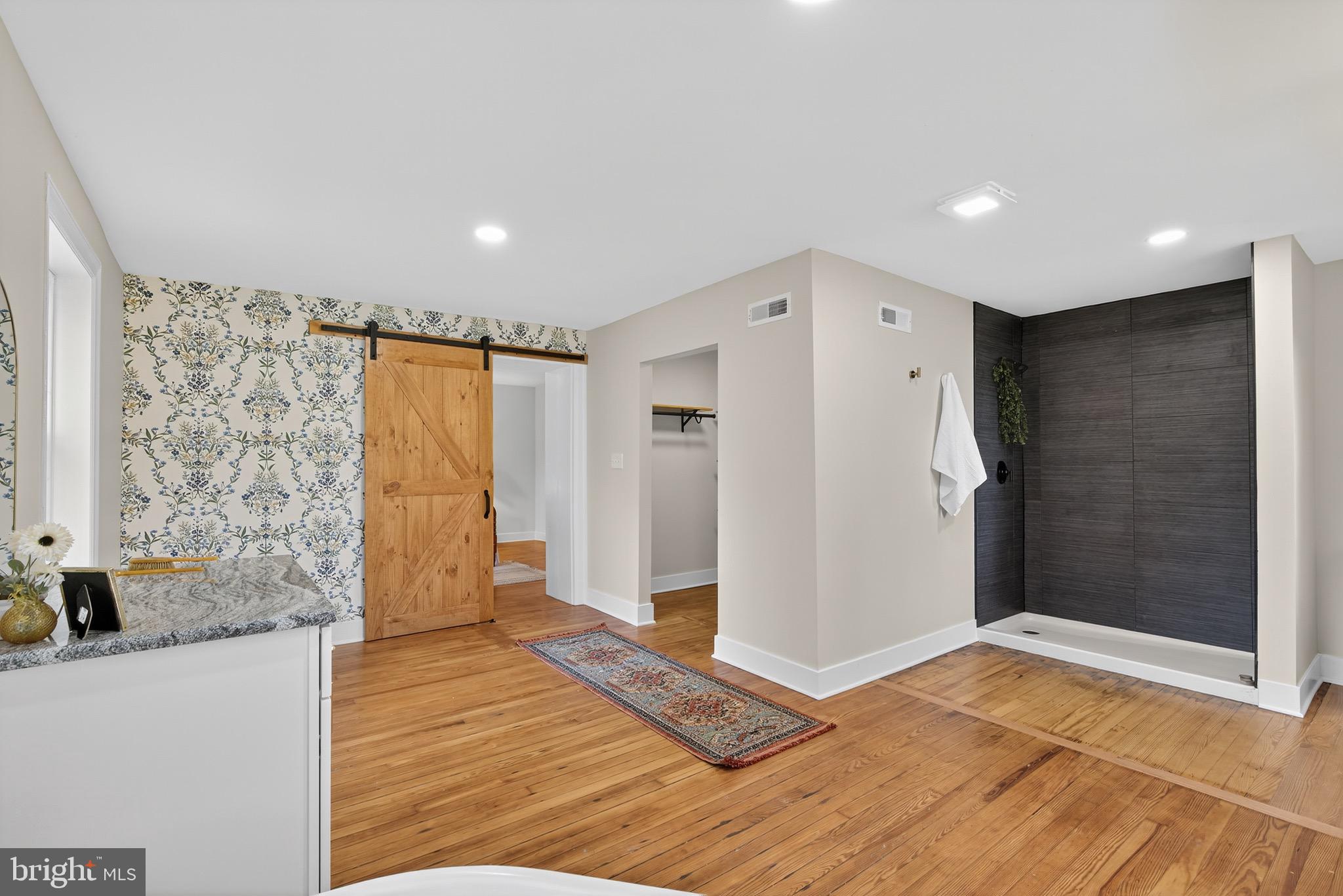 225 East Canal Road York, PA 17404 - Photo 47 of 81 a view of a livingroom with wooden floor and a bathroom