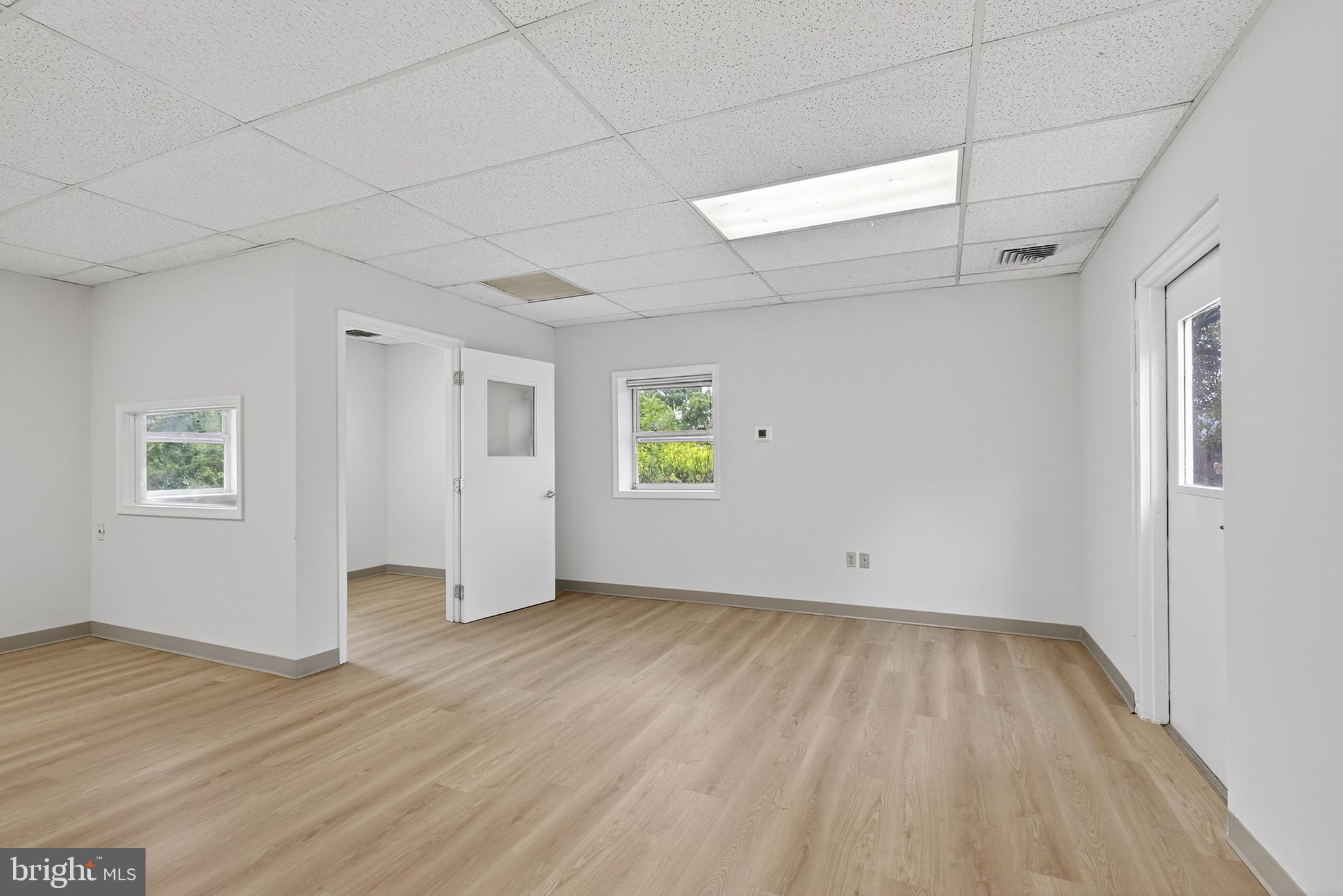225 East Canal Road York, PA 17404 - Photo 72 of 81 an empty room with wooden floor and windows