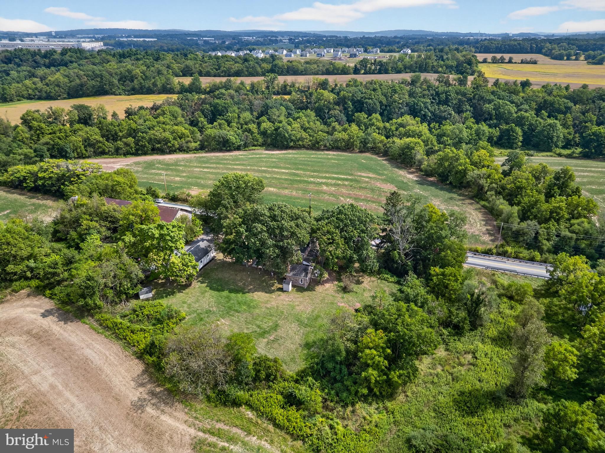 225 East Canal Road York, PA 17404 - Photo 80 of 81 an aerial view of green landscape with trees houses and mountain view