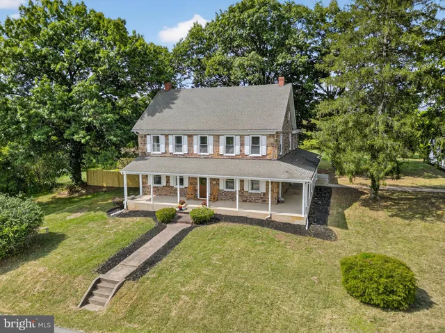 a room with furniture and a window