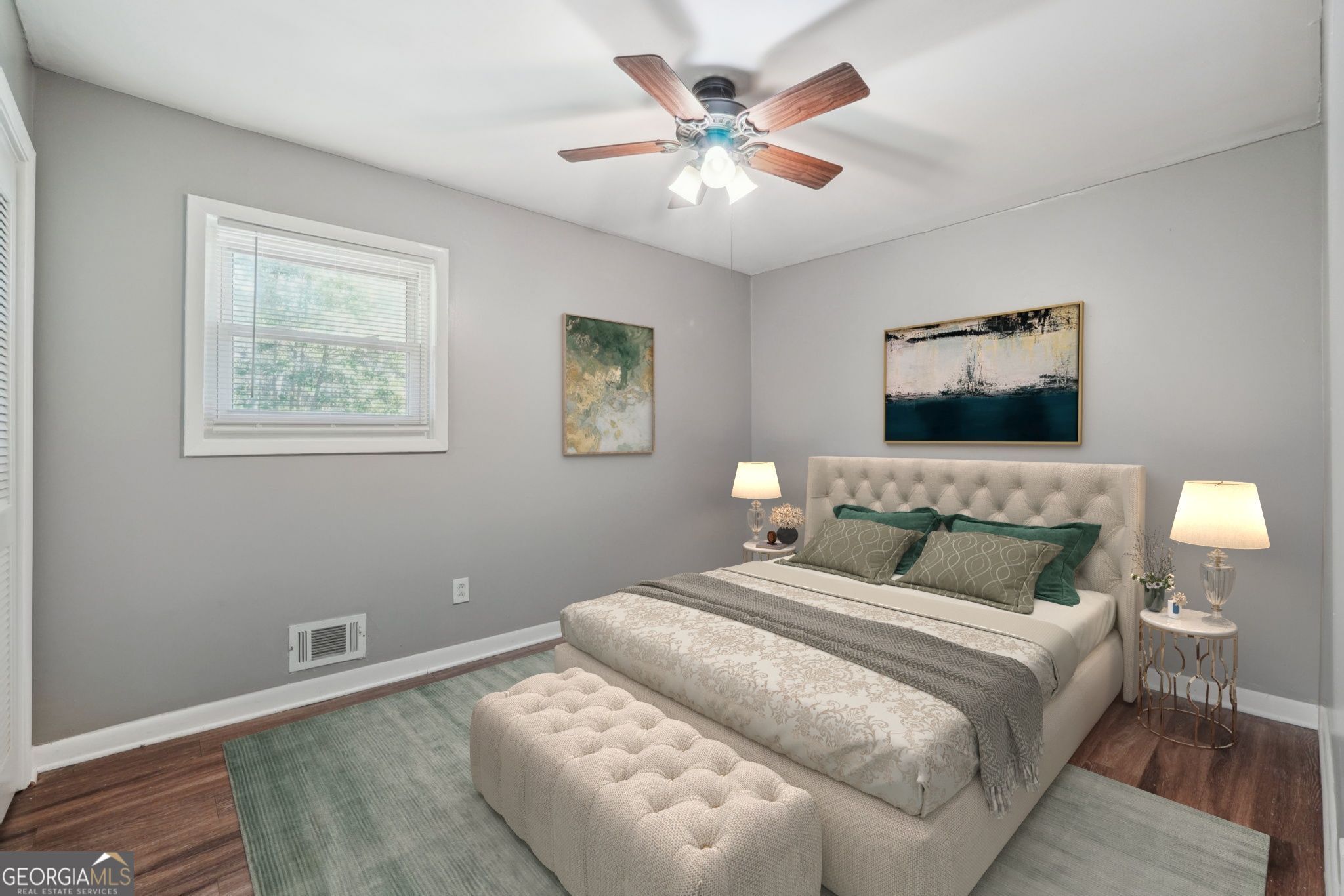 2419 Greenway Drive Decatur, GA 30035 - Photo 13 of 25 a bedroom with a large bed and a chandelier