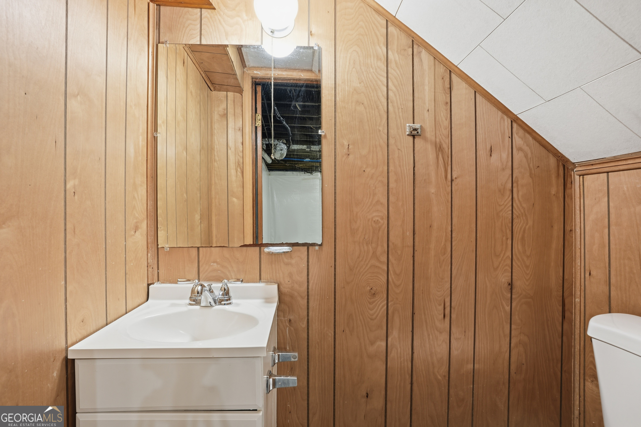 2419 Greenway Drive Decatur, GA 30035 - Photo 22 of 25 a bathroom with a sink a toilet and shower