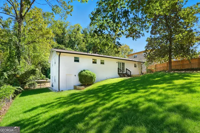 a view of a back yard of the house