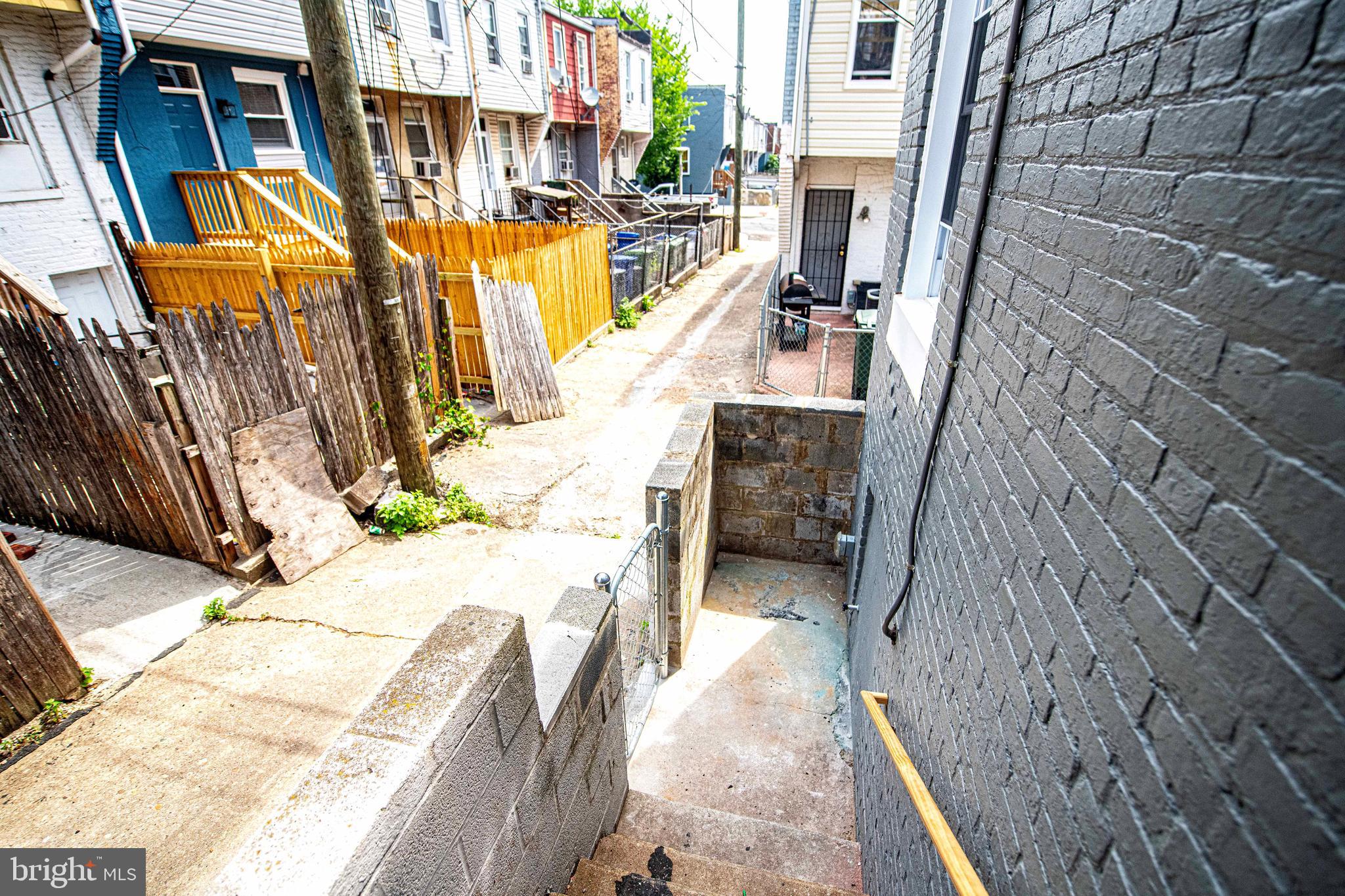 535 North Decker Avenue Baltimore, MD 21205 - Photo 22 of 24 a view of a patio with a chairs and a table
