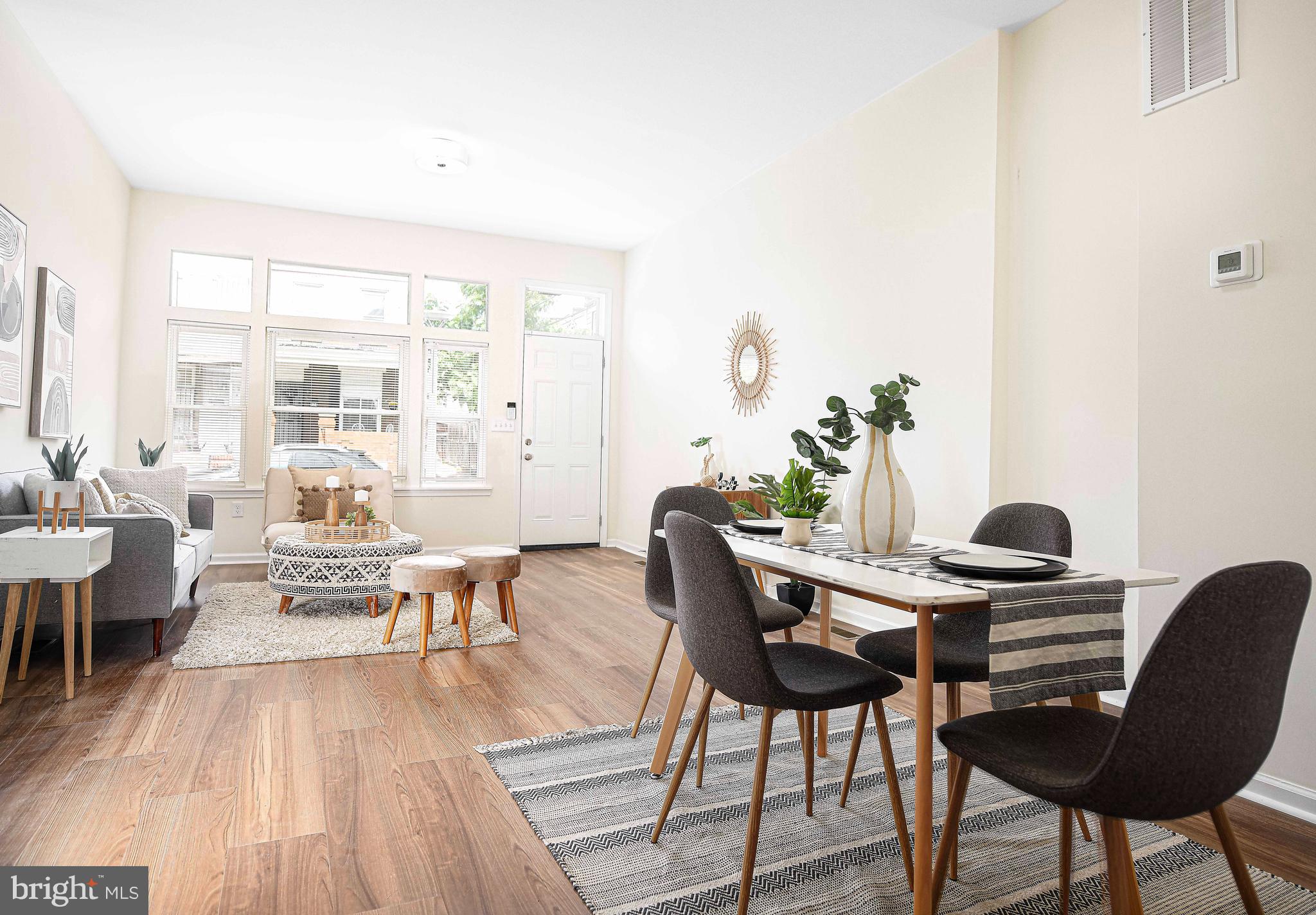 535 North Decker Avenue Baltimore, MD 21205 - Photo 7 of 24 a view of a dining room with furniture and wooden floor