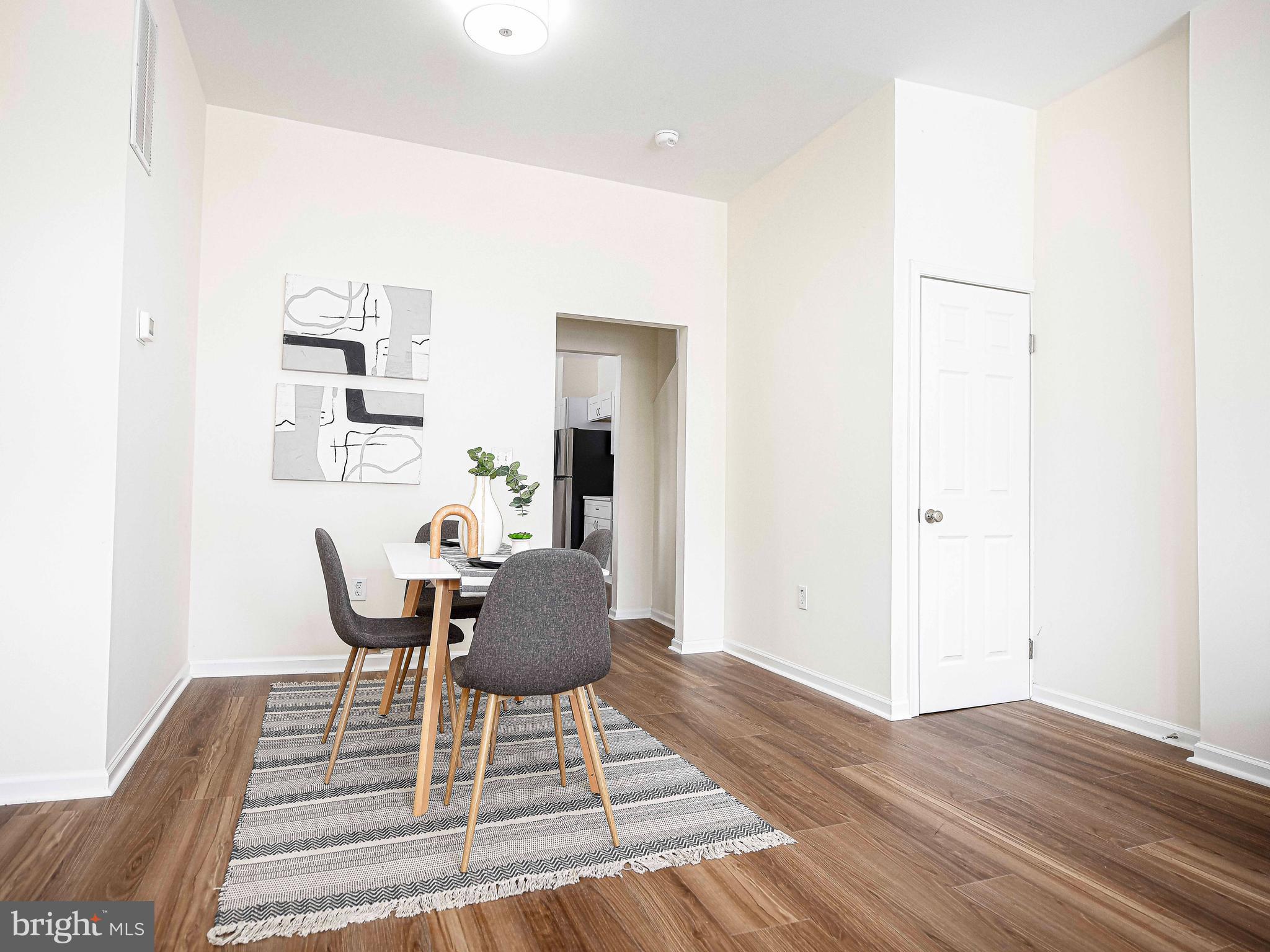535 North Decker Avenue Baltimore, MD 21205 - Photo 9 of 24 a workspace with furniture and wooden floor