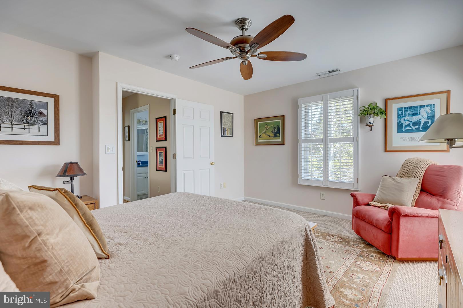 33006 Deer Trail Millville, DE 19967 - Photo 15 of 54 a bedroom with a bed couch and window