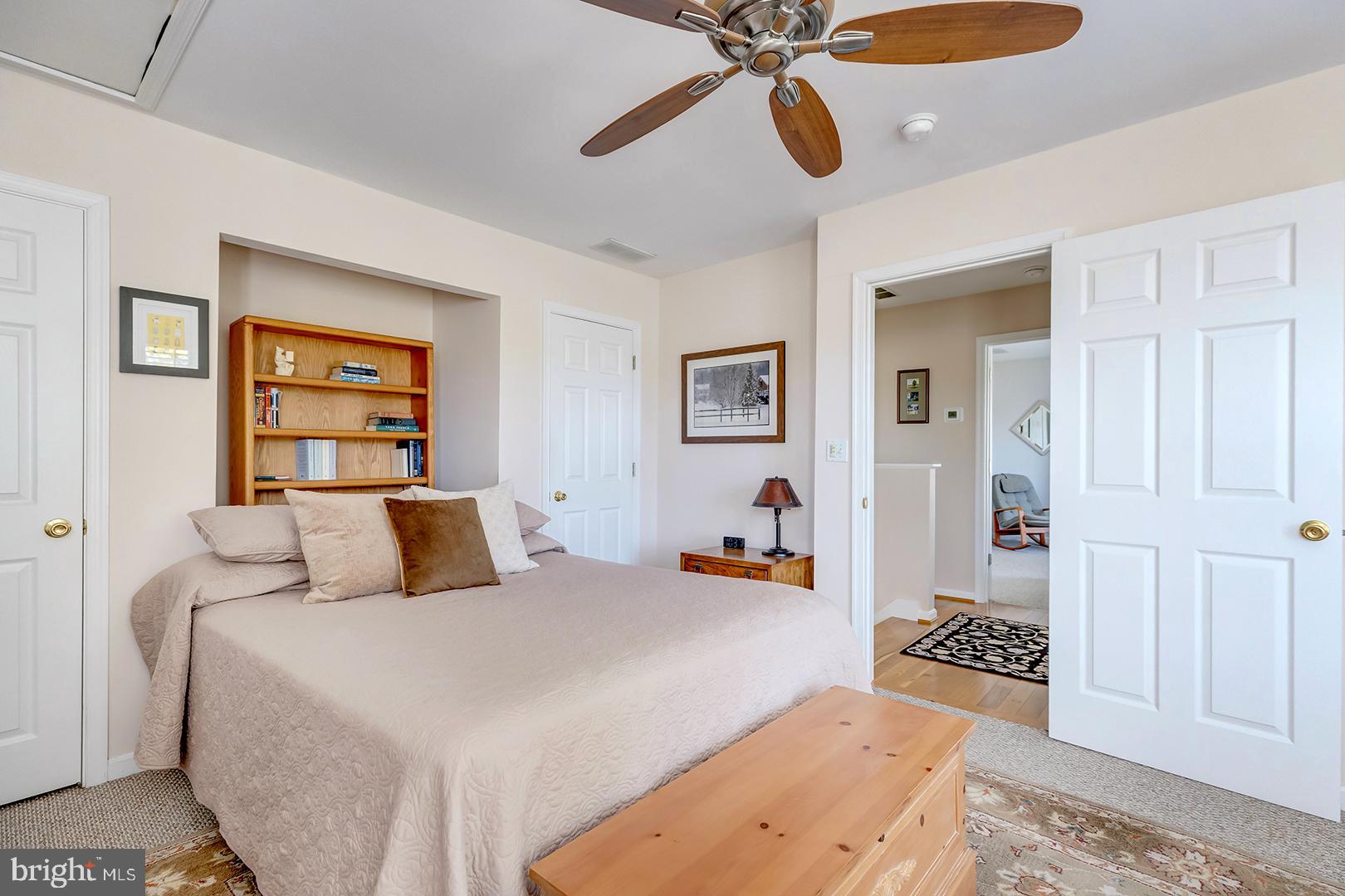 33006 Deer Trail Millville, DE 19967 - Photo 16 of 54 a bedroom with a bed and ceiling fan