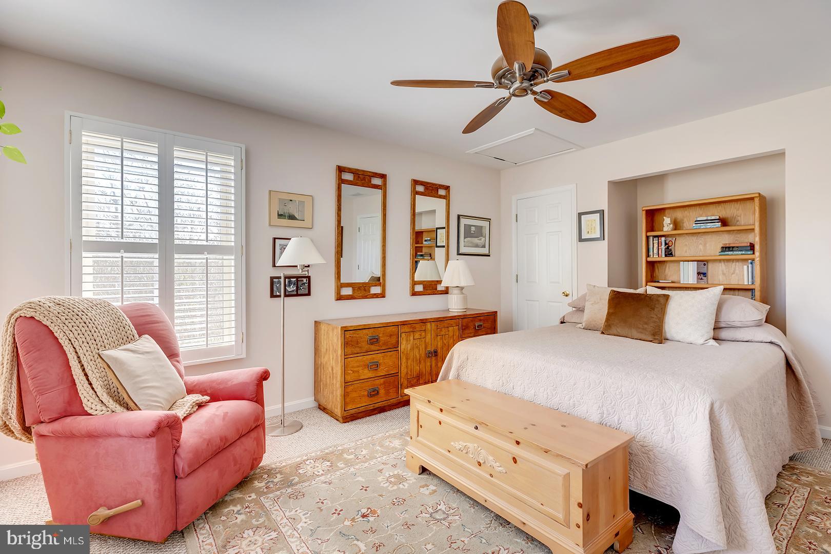 33006 Deer Trail Millville, DE 19967 - Photo 18 of 54 a bedroom with a bed couch and window
