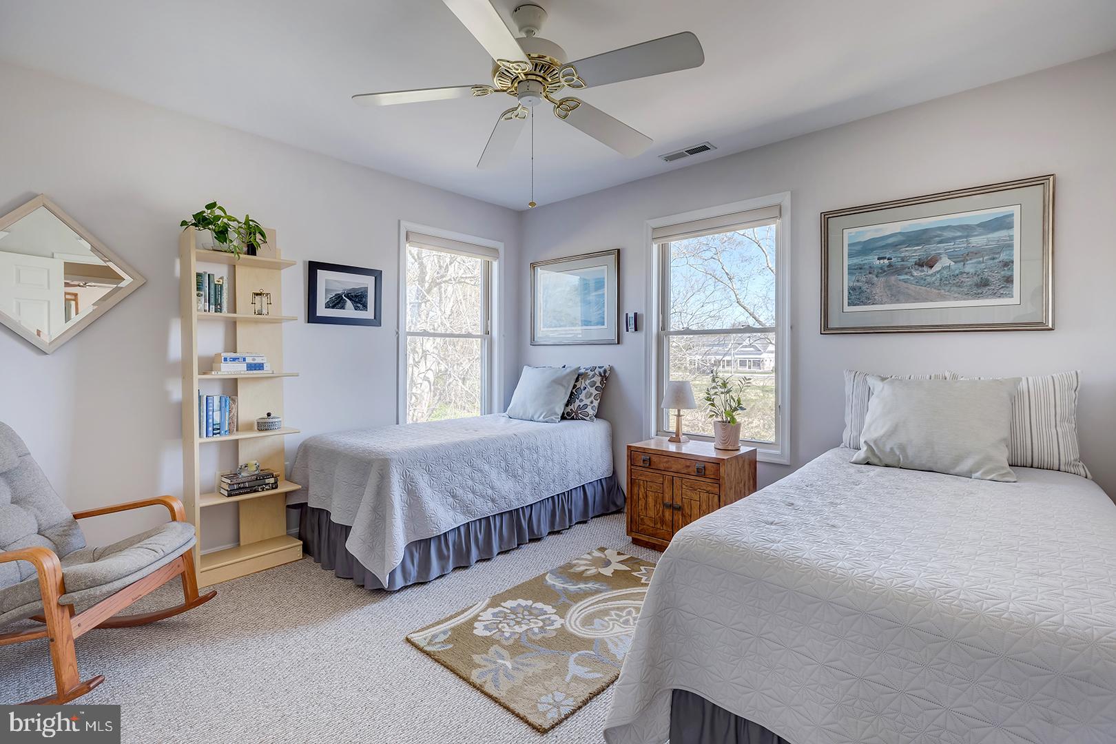 33006 Deer Trail Millville, DE 19967 - Photo 28 of 54 a bedroom with a bed and a window