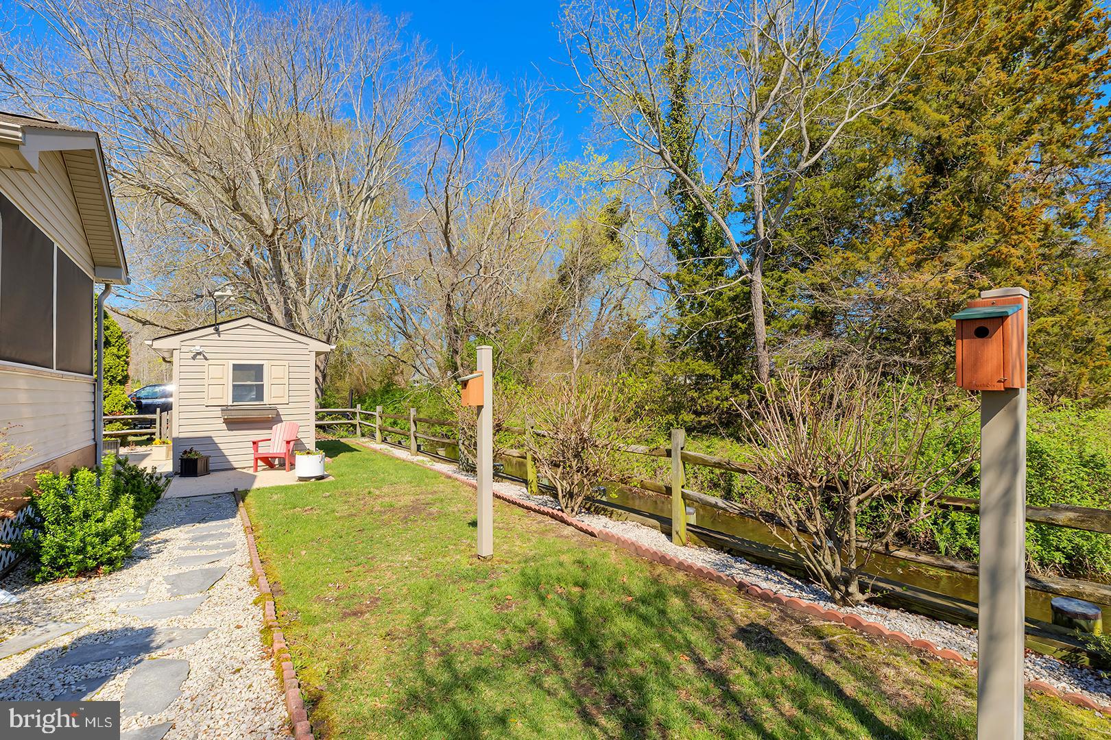 33006 Deer Trail Millville, DE 19967 - Photo 46 of 54 a view of backyard with swimming pool