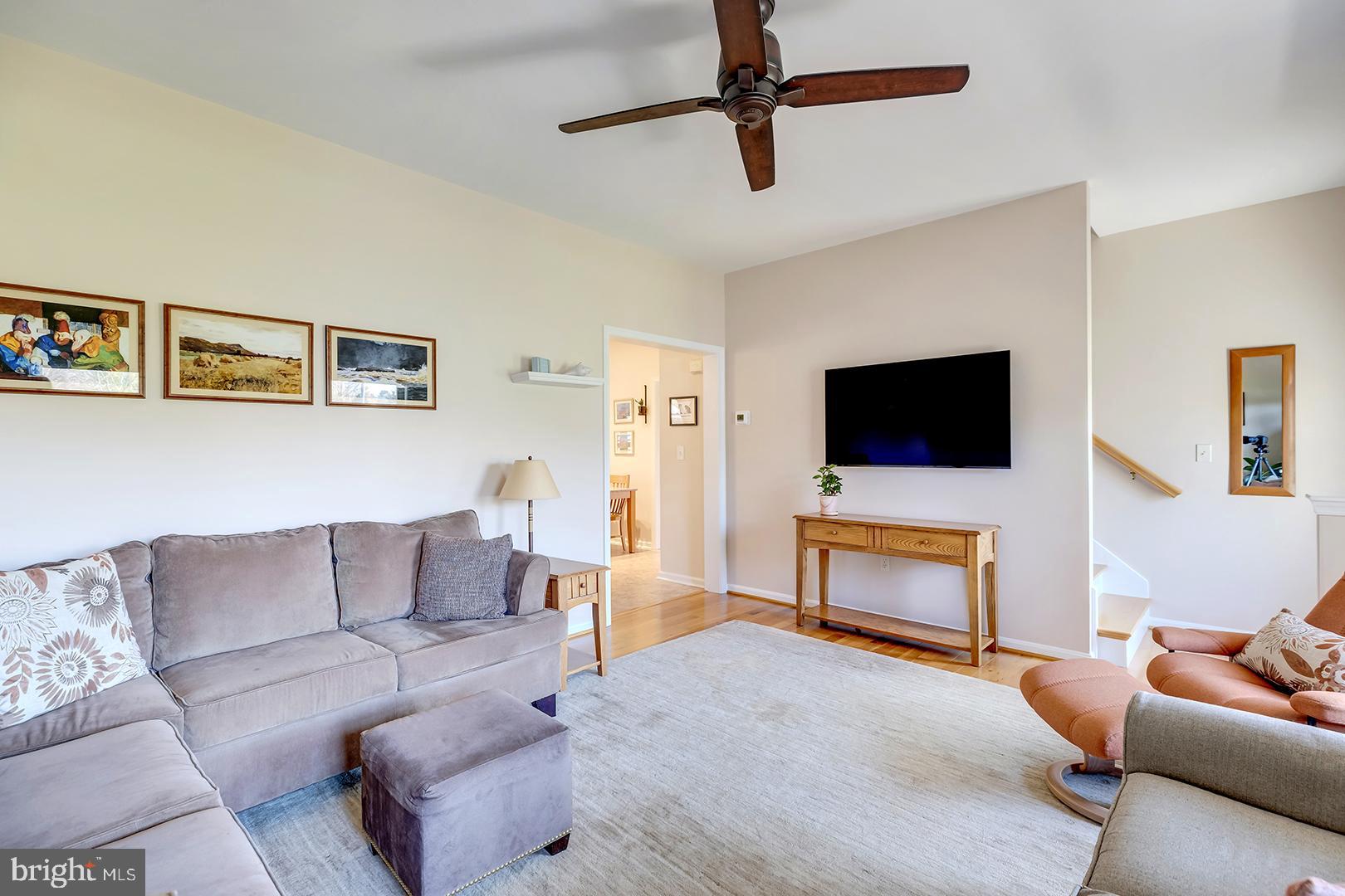 33006 Deer Trail Millville, DE 19967 - Photo 8 of 54 a living room with furniture and a flat screen tv