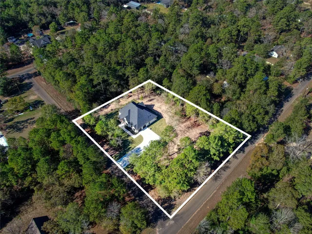 a view of balcony and yard