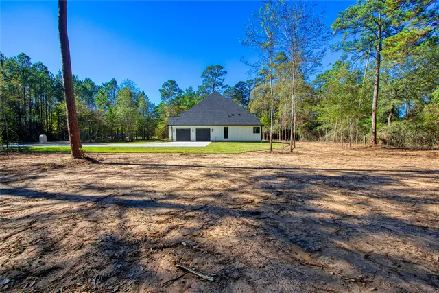 a house view with a outdoor space