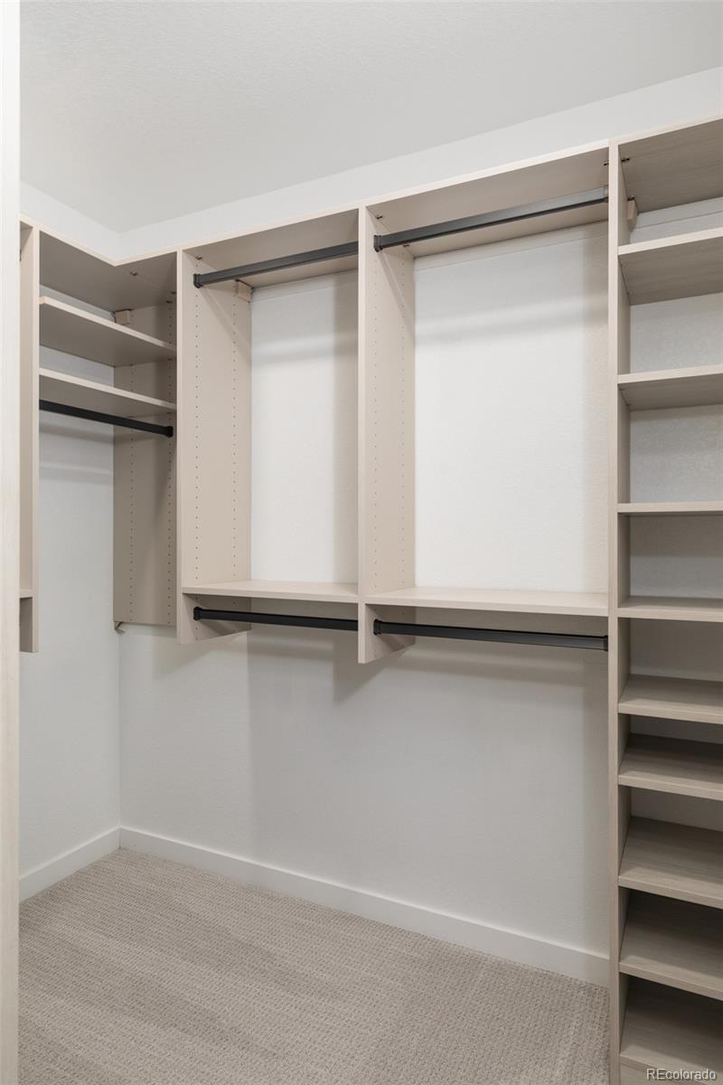 5230 Stuart Street Denver, CO 80212 - Photo 21 of 34 a view of an empty walk in closet