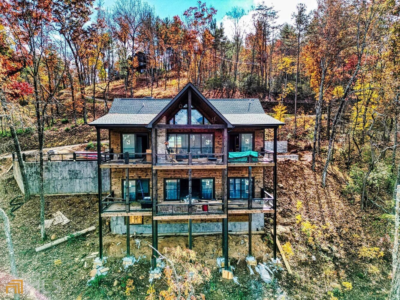 263 Oasis Drive Blue Ridge, GA 30513 - Photo 1 of 1 a house with swimming pool in front of it