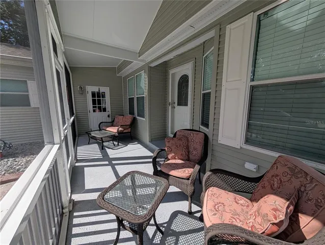 a building outdoor space with patio furniture