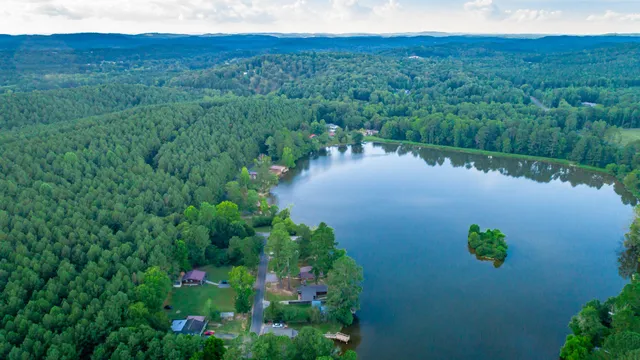 a view of a lake with a yard