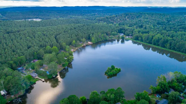 a view of a lake with a yard