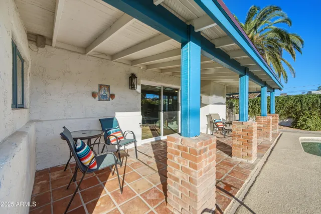a view of a house with swimming pool