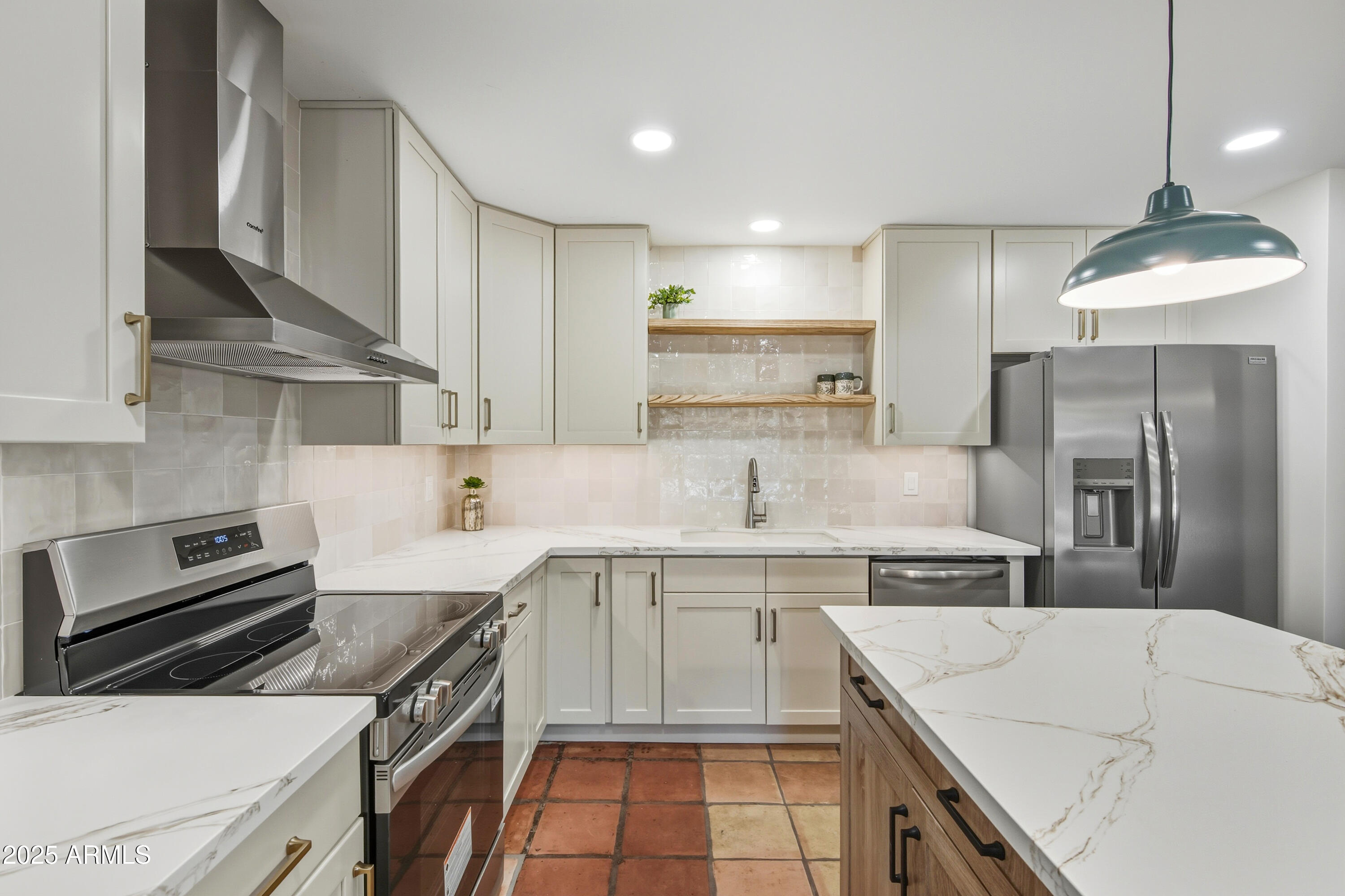 537 North Jay Street Chandler, AZ 85225 - Photo 3 of 39 a kitchen with a sink stove and refrigerator