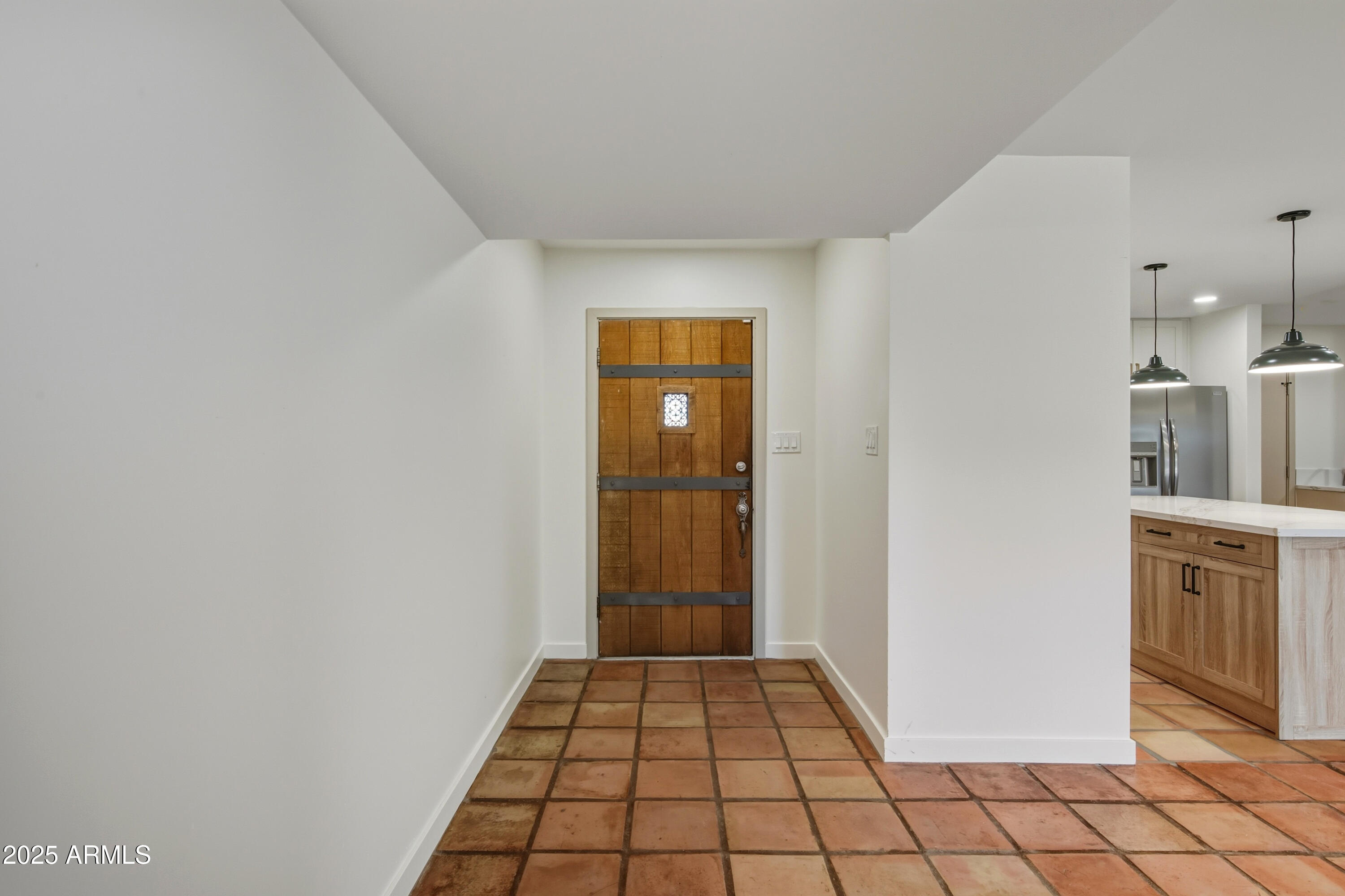 537 North Jay Street Chandler, AZ 85225 - Photo 9 of 39 a view of a livingroom with an empty space and window