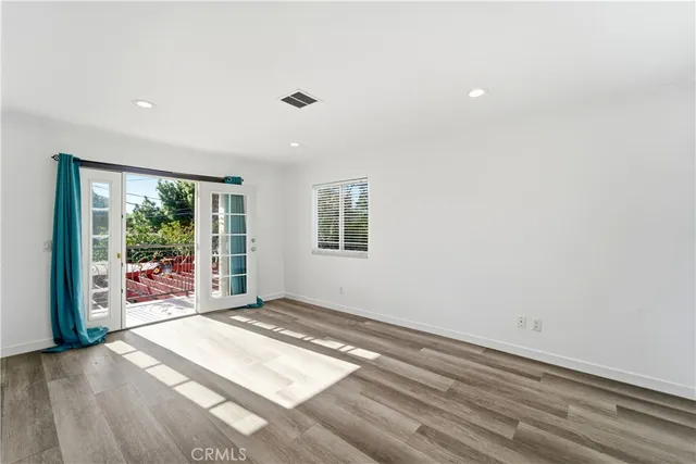 a view of livingroom with furniture window and front door