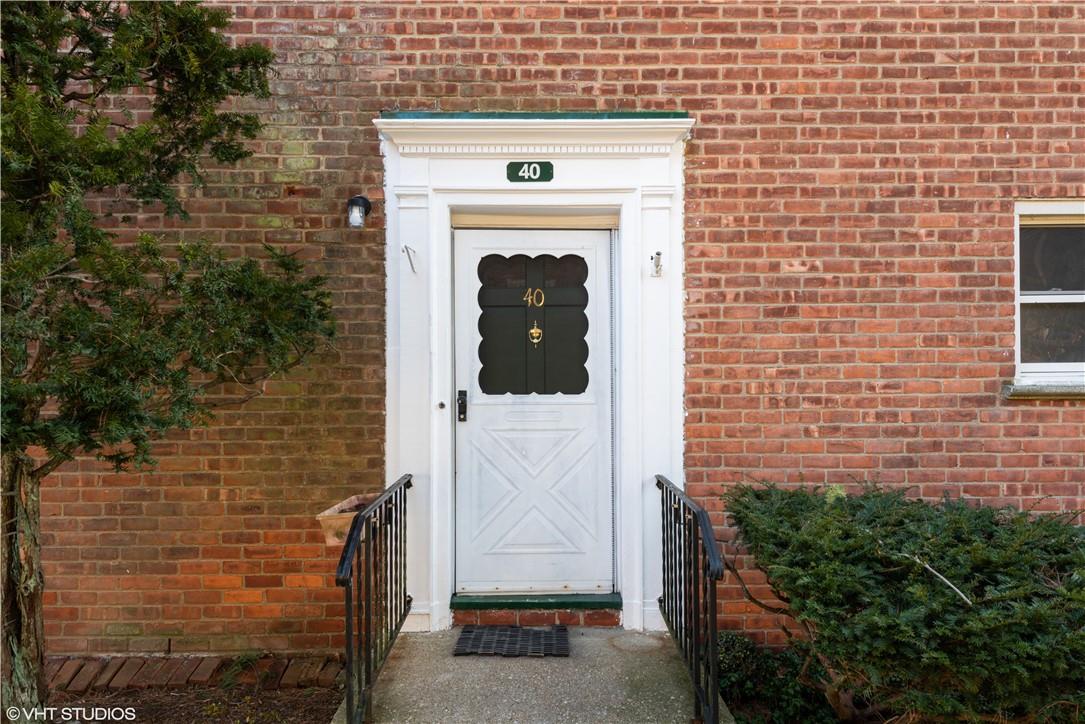 176 Pinewood Road, Unit 40 Hartsdale, NY 10530 - Photo 1 of 1 a front view of a house with an entrance