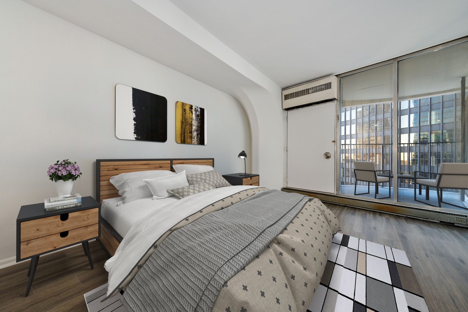300 North State Street, Unit 3330 Chicago, IL 60654 - Photo 12 of 20 a bedroom with a bed and a large window