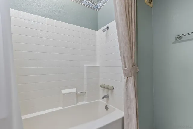 a bathroom with a bathtub