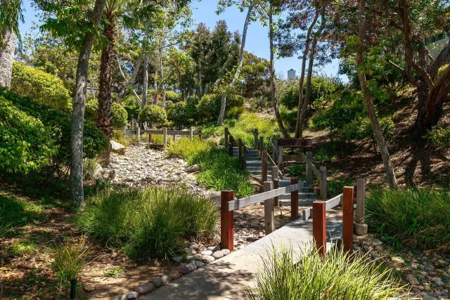 a view of a swimming pool with outdoor seating