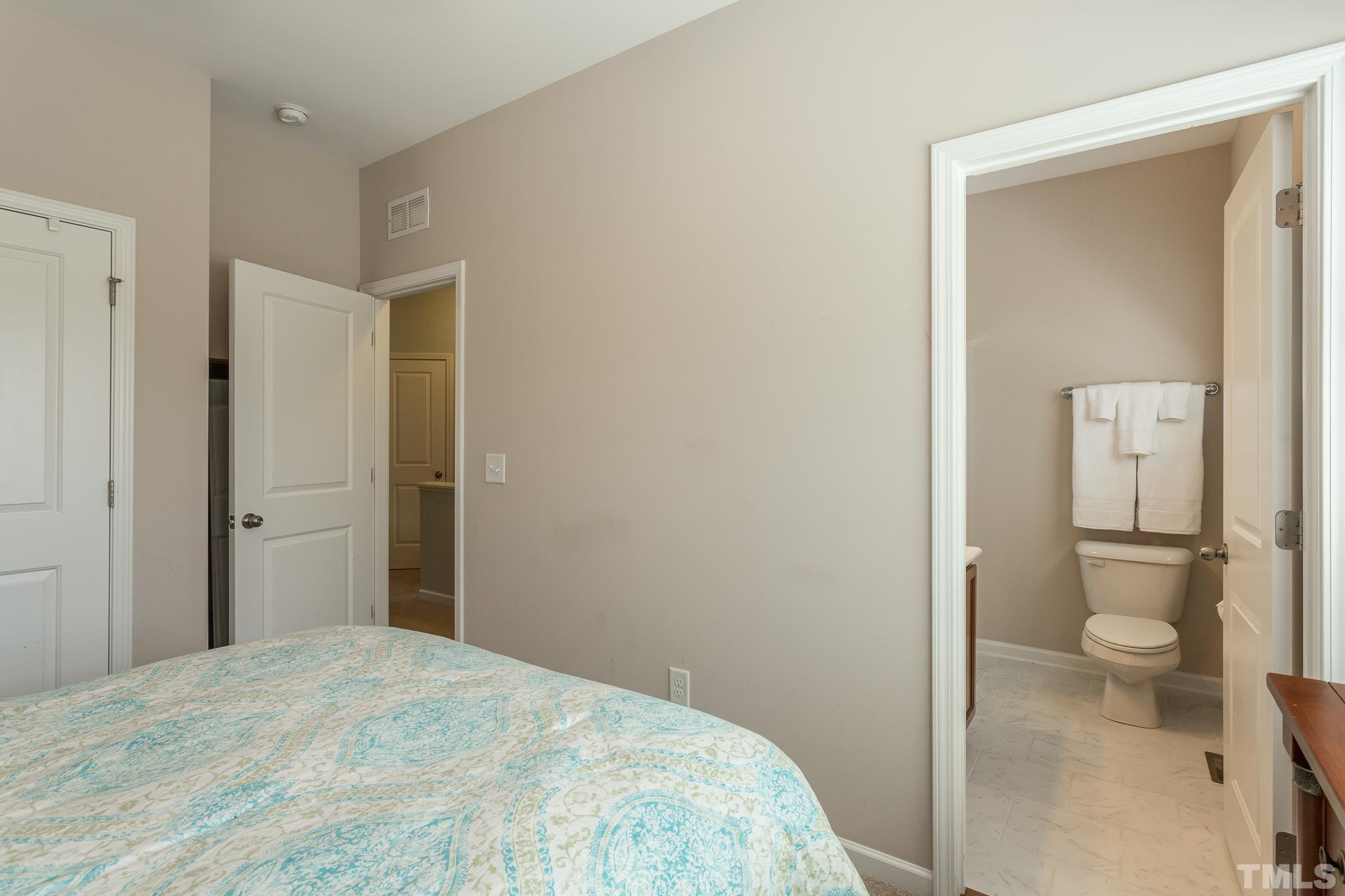1621 Crafton Way Raleigh, NC 27607 - Photo 26 of 30 a bathroom with a toilet and a shower