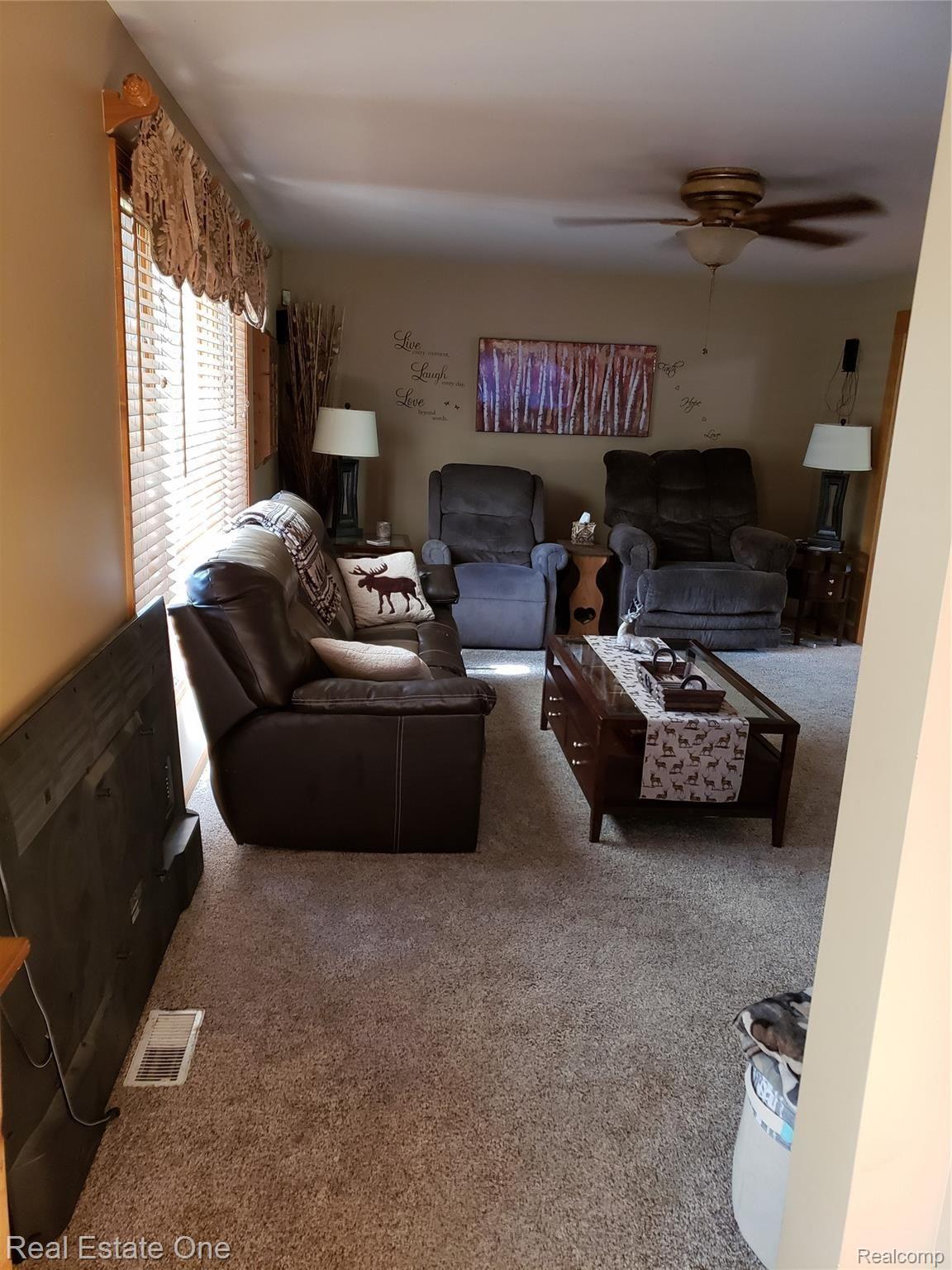 4708 Klam Road Columbiaville, MI 48421 - Photo 8 of 61 klam living room.jpg