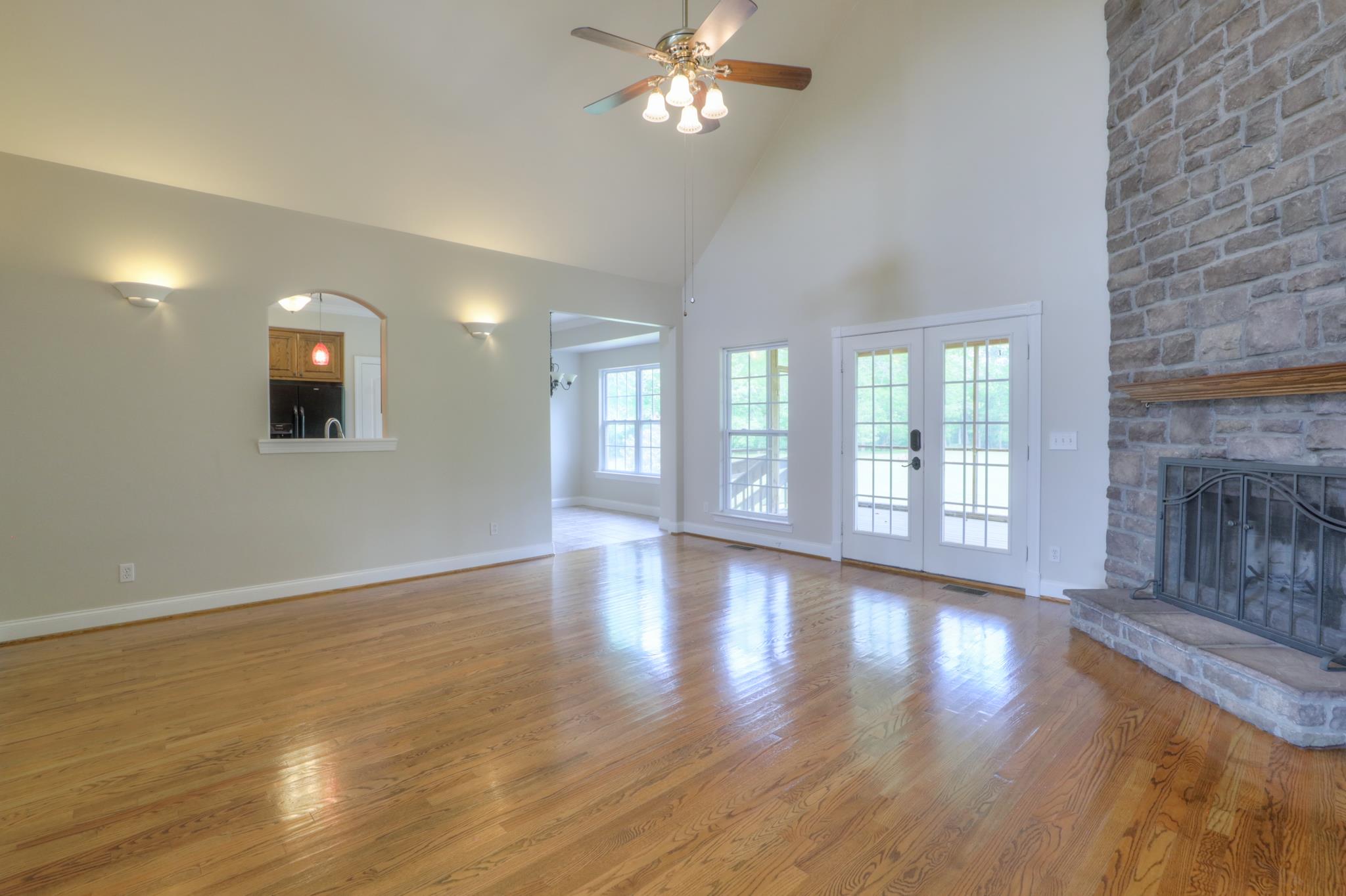 202 Ridgewater Way Mount Juliet, TN 37122 - Photo 11 of 30 a view of a livingroom with a ceiling fan and hardwood floor
