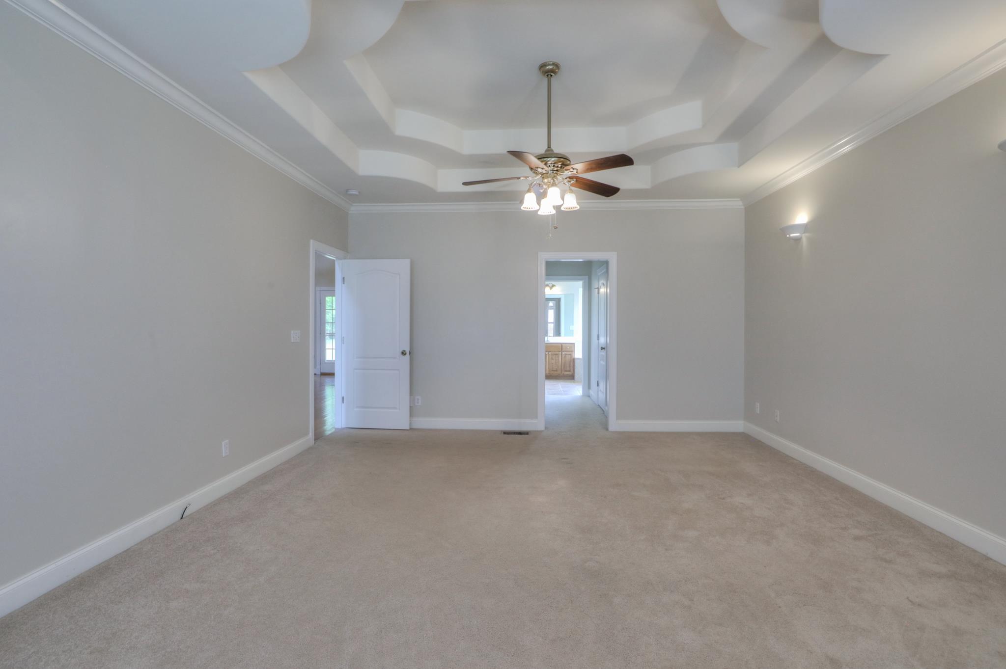 202 Ridgewater Way Mount Juliet, TN 37122 - Photo 16 of 30 an empty room with chandelier fan and windows