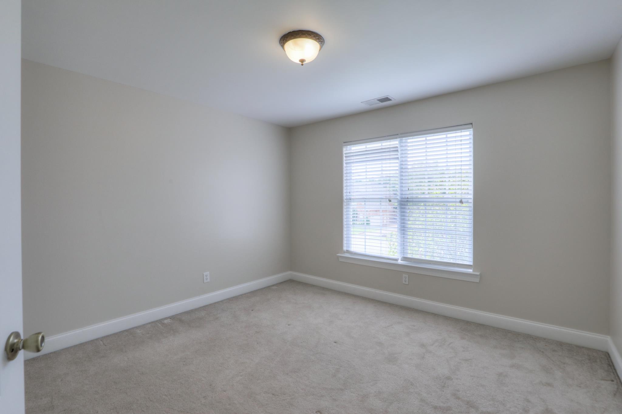 202 Ridgewater Way Mount Juliet, TN 37122 - Photo 19 of 30 an empty room with a window